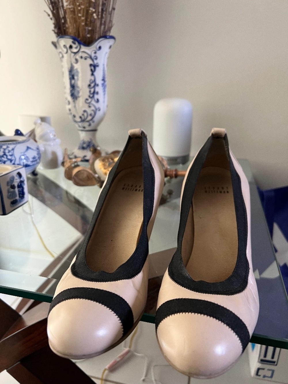 Stuart Weitzman beige and black shoes